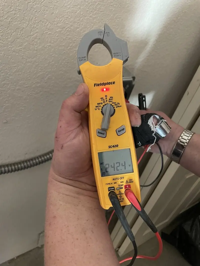 Voltage testing with clamp meter during Generator Installation in Green River